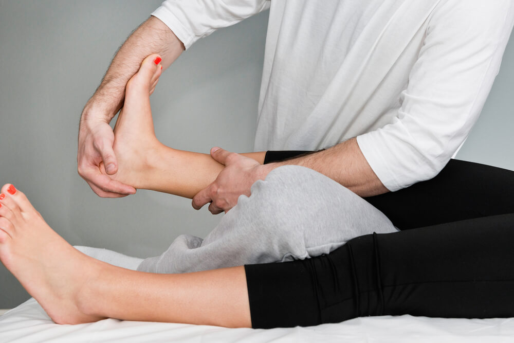 Why does elevating a sports injury help it heal?