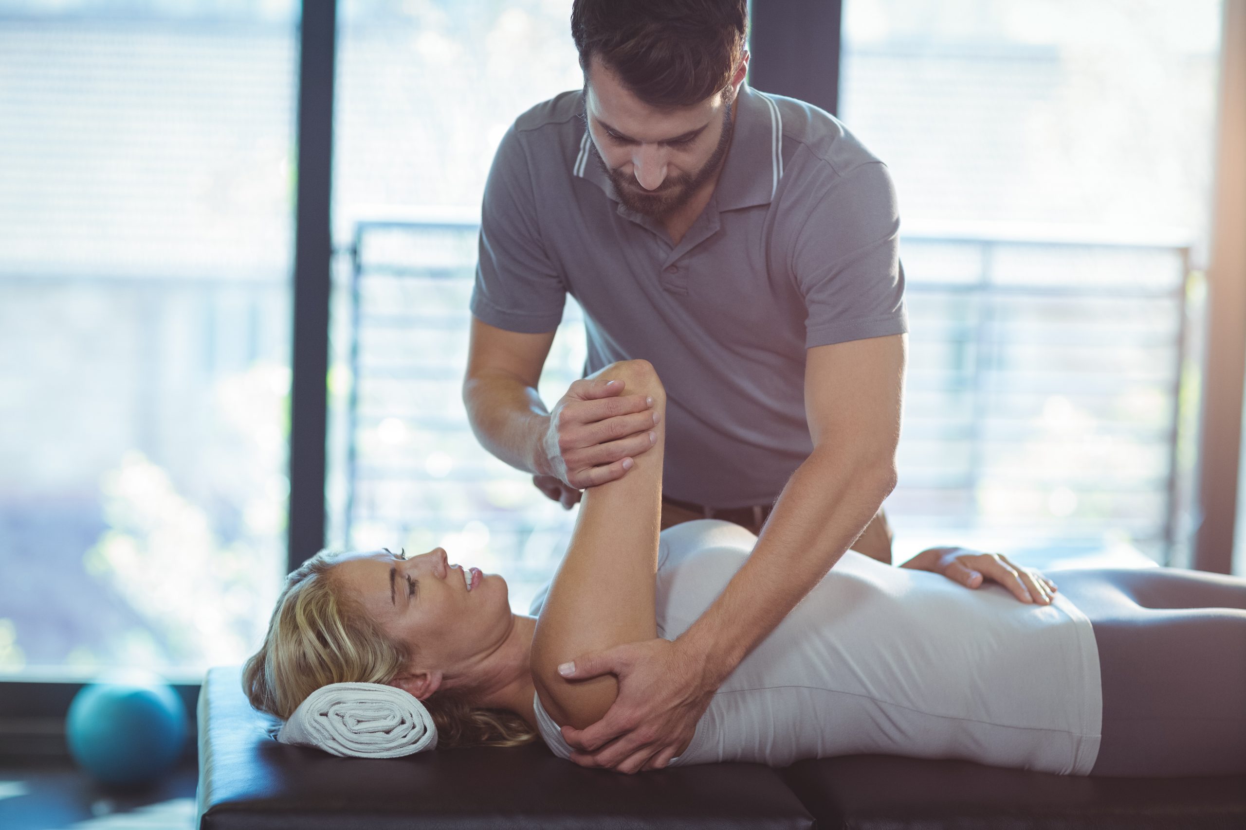 How direct-to-patient marketing can help you increase self-referrals physiotherapist giving shoulder therapy to a woman 2021 08 28 17 17 54 utc scaled How direct-to-patient marketing can help you increase self-referrals